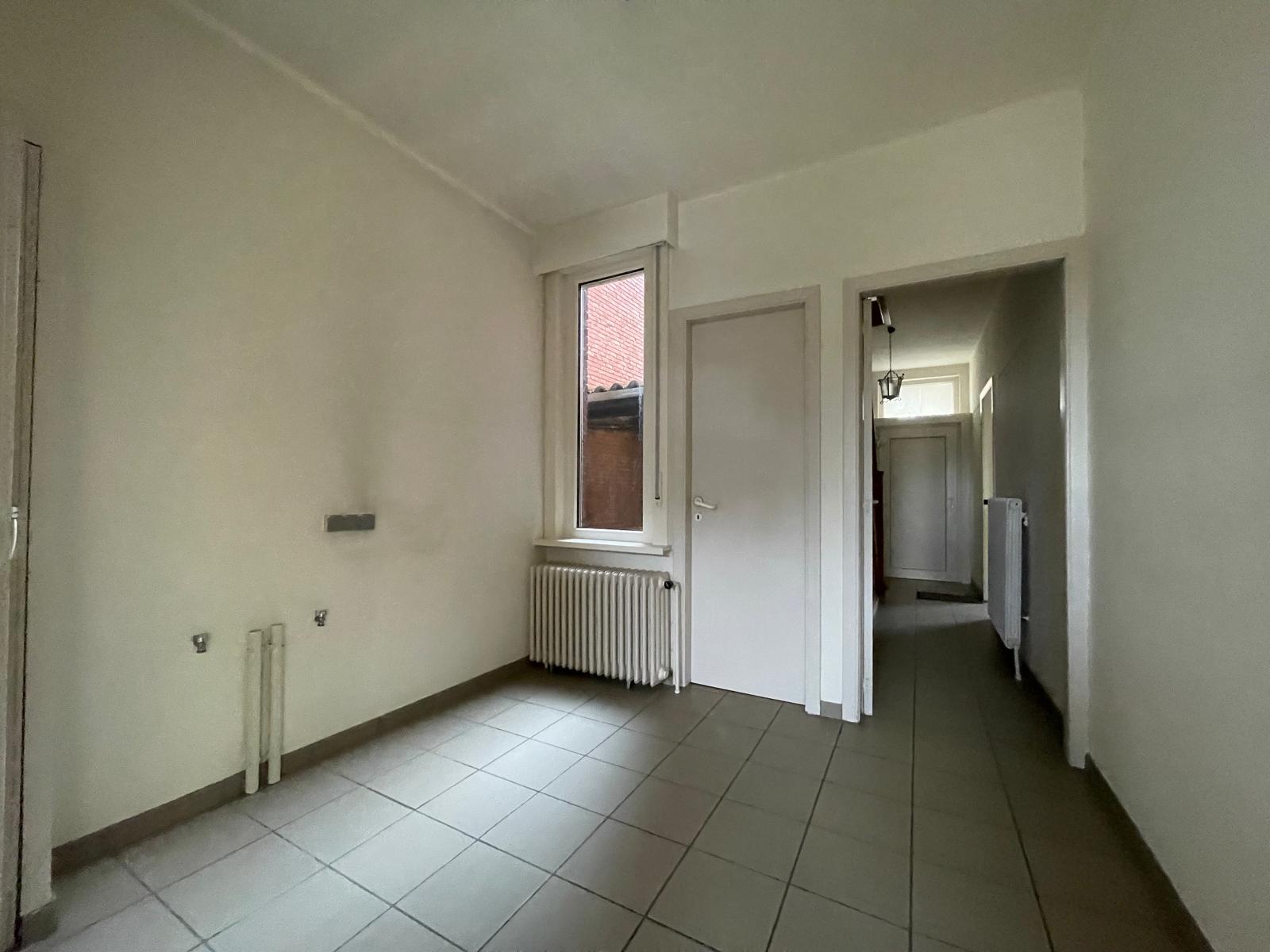 Ruime woning met tuin vlakbij centrum - foto 3