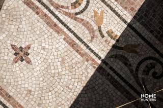 In het hart van Ieper schittert deze majestueuze herenwoning, een parel van "Vieux-Neuf"-architectuur. Een meesterwerk van architect Jules Coomans...