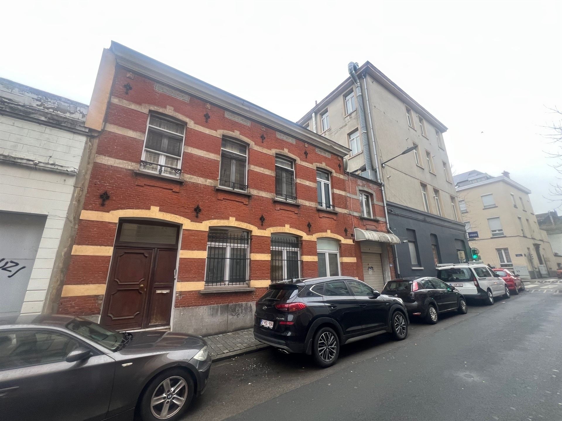 Opbrengsteigendom met commerciële gelijkvloers en 6 appartementen - foto 4