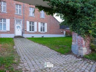 Former RectoryAt Kapelhofstraat 21, in the heart of the village of Erondegem, stands this stately (former) rectory on an exceptional plot of 4,057...