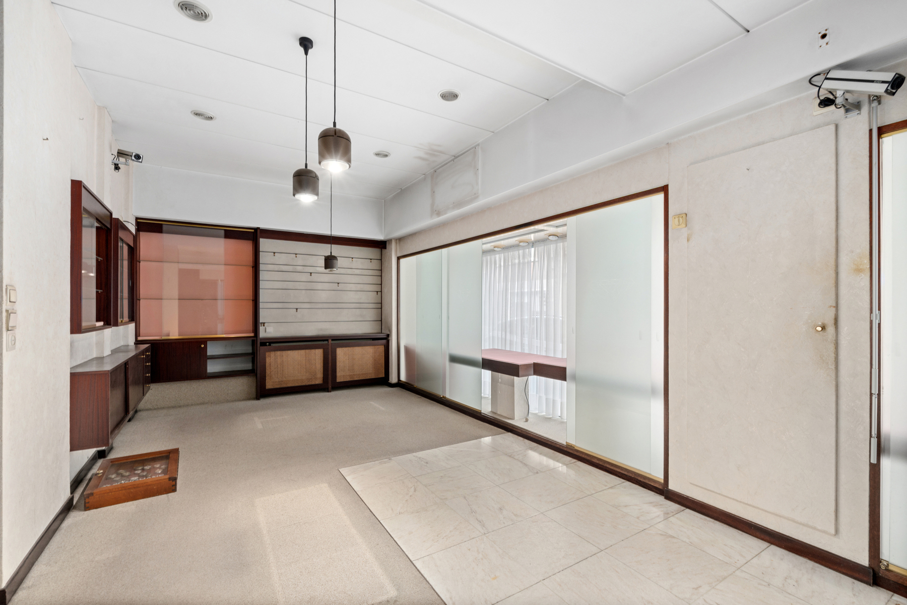 Handelspand met woonst, gevel 10 m en garage in Kessel-Lo. - foto 4