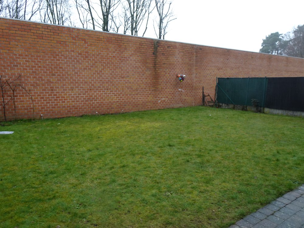 Een energiezuinig gelijkvloers appartement met 2 slaapkamers, privé tuin en garage - foto 4
