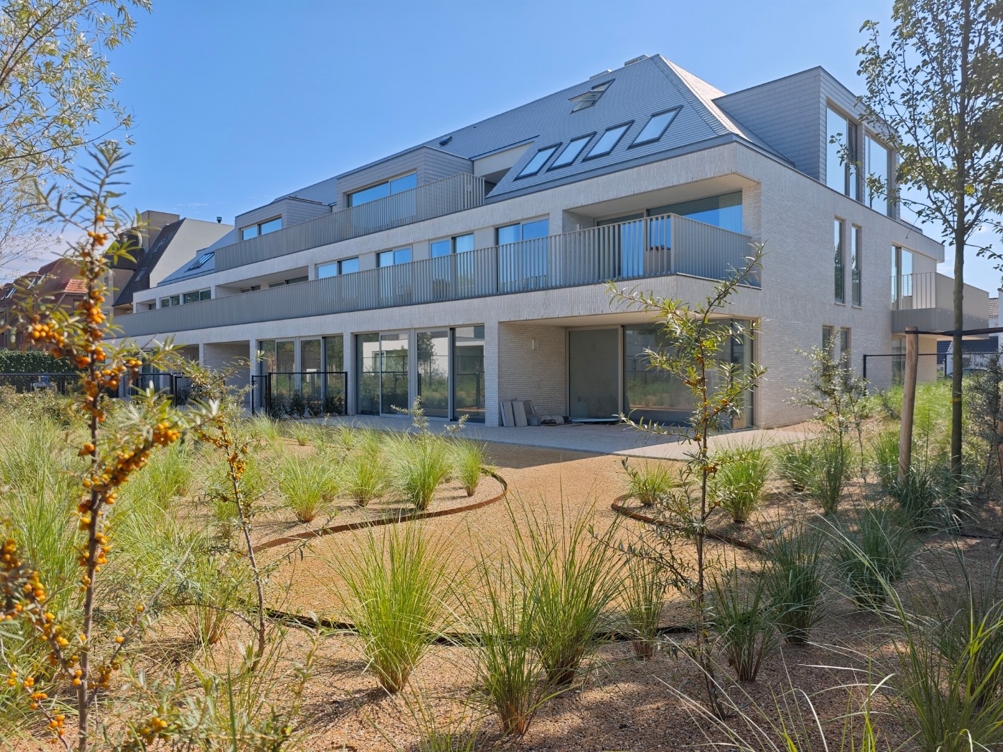 Gelijkvloers appartement met hoogstaande afwerkingen en energiezuinig karakter in nieuwbouwresidentie Aquilo - foto 1