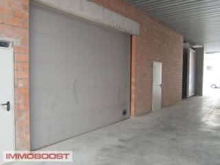 Antwerpen - Hobken , professionele MAGAZIJN - UNIT van 100m², hoge sectionaalpoort, water, elektriciteit, sanitair, drijfkracht, 100% veilig en droog!