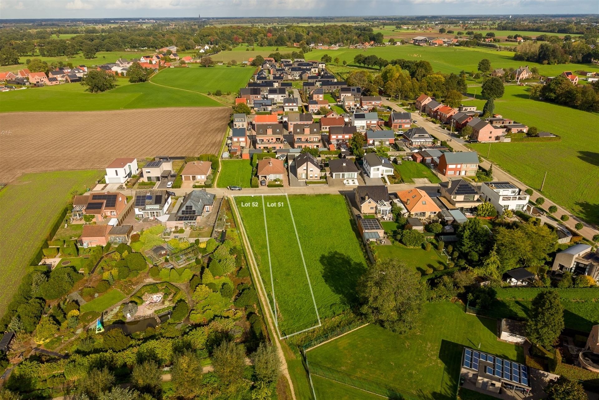 Bouwgrond (lot 52) van 556 m² voor halfopen bebouwing - foto 4