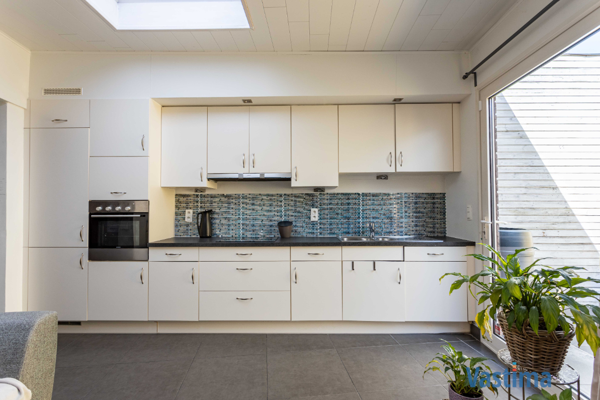 Energiezuinige en instapklare starterswoning met 2 slaapkamers in hartje Erembodegem - foto 5