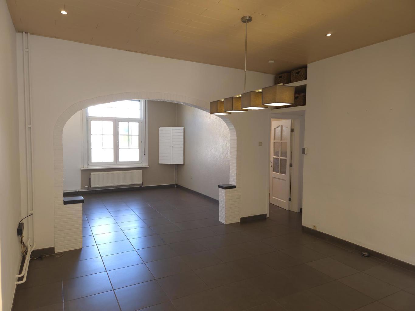 Halfopen bebouwing nabij centrum Arendonk met ruime tuin. - foto 2