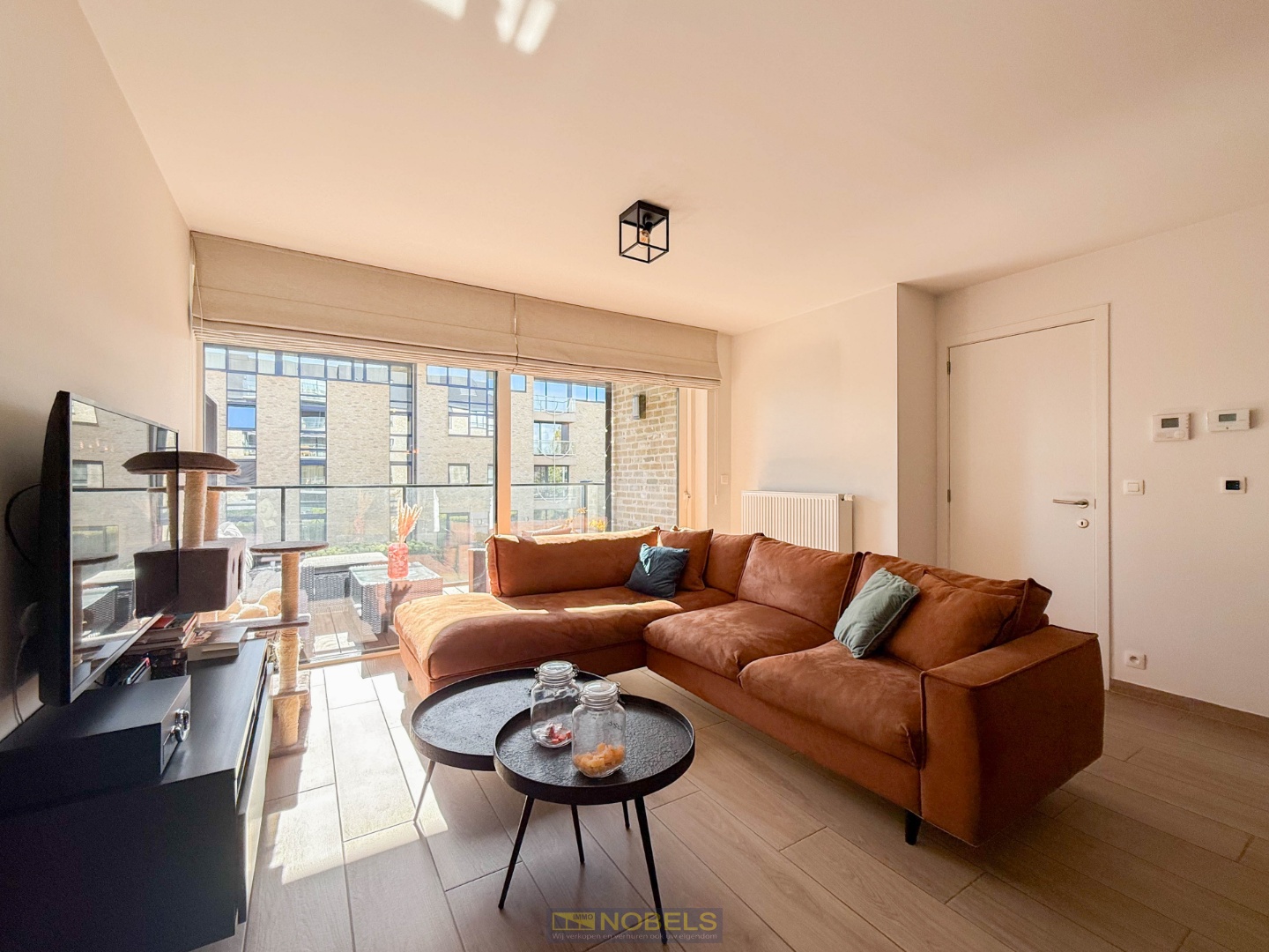 Te koop, modern afgewerkt appartement met terras en staanplaats te Oudenaarde - photo 1