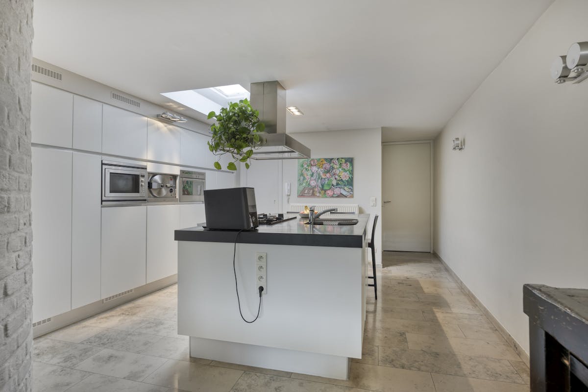 Stijlvolle stadswoning met handelspand te koop in hartje Maaseik - foto 5