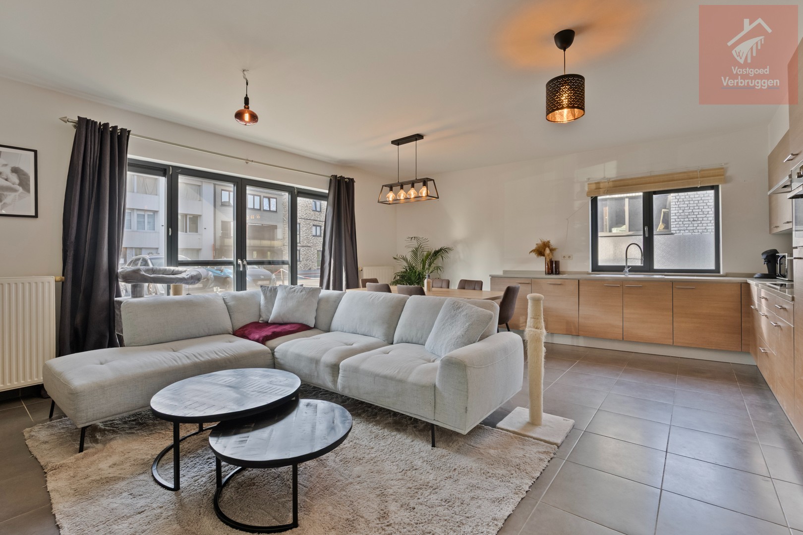 Modern instapklaar gelijkvloers appartement met 2 slpk, terrassen en autostaanplaats - foto 4