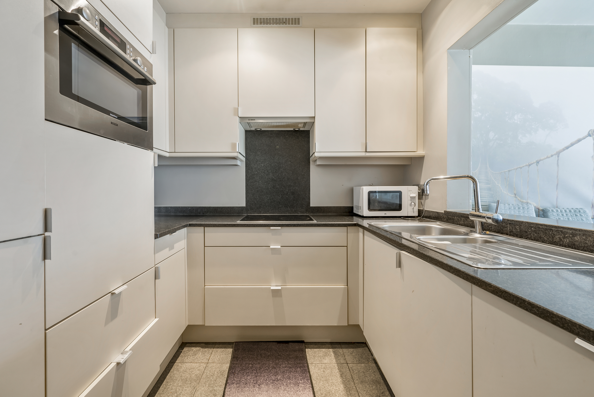 Gelijkvloers appartement met 2 slaapkamers in Beveren - foto 5