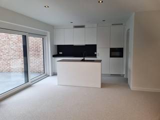 Dit centraal gelegen NB appartement beschikt over een ondergrondse autostaanplaats via autolift, privé-berging in de kelder,...