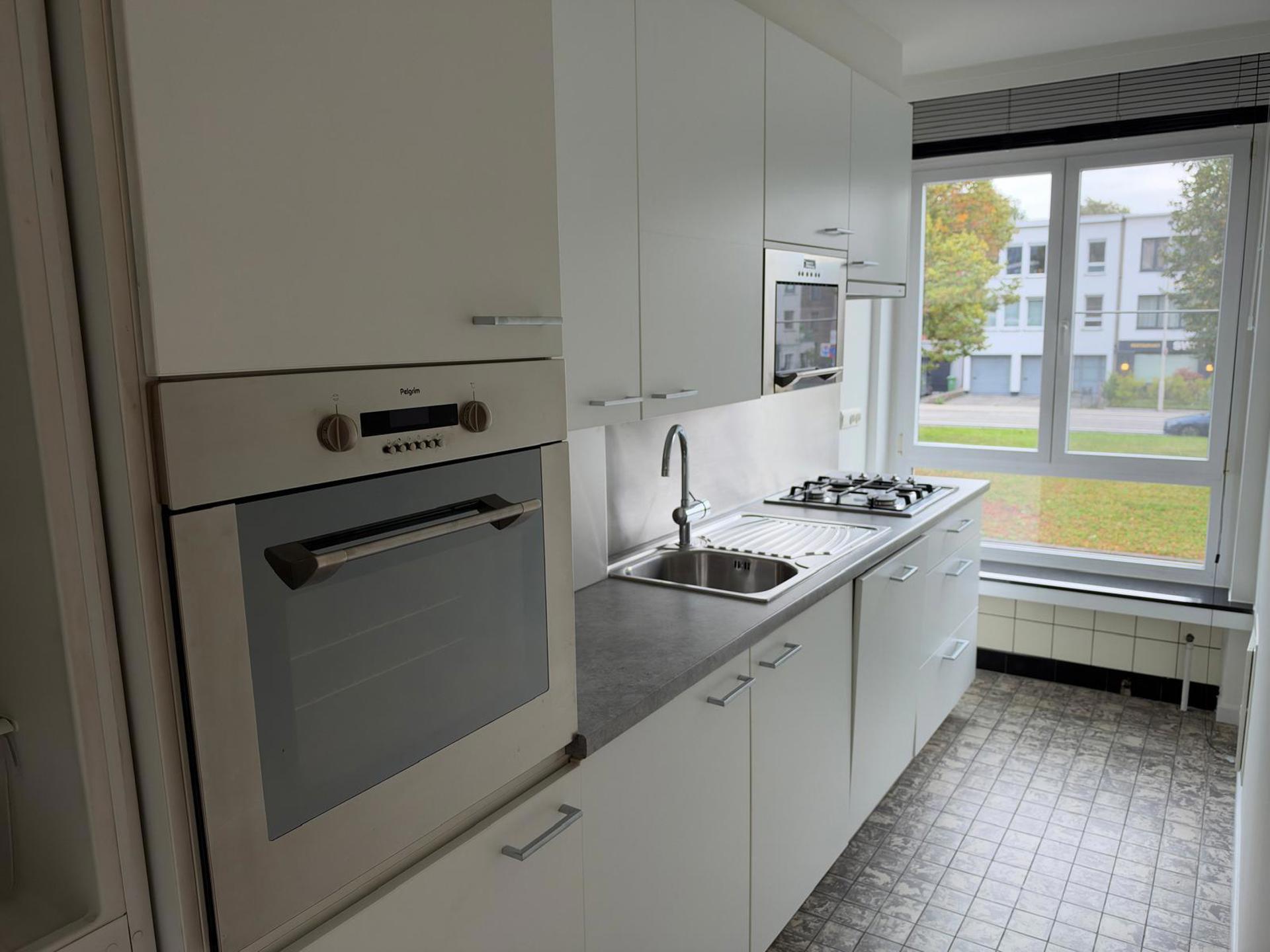 Gezellig appartement met 2 slk, terras en garage! - foto 5