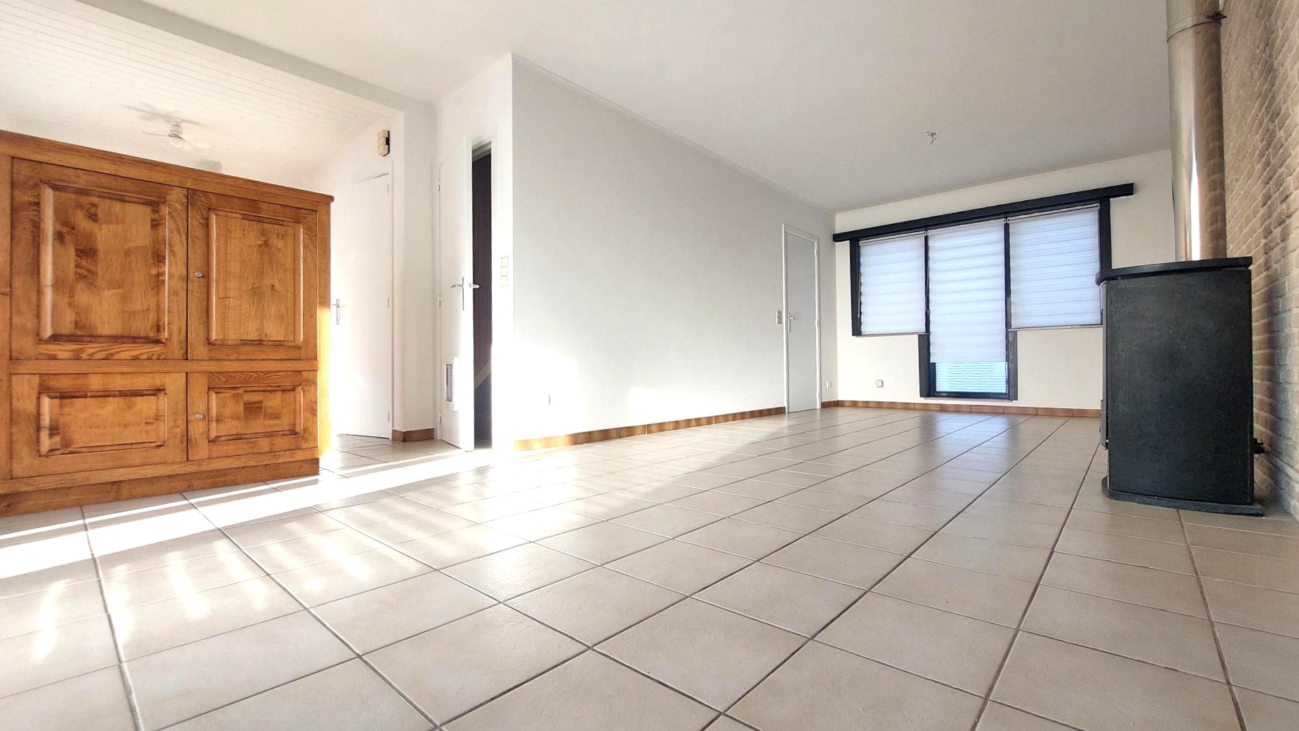 Rijwoning met 4 slaapkamers, zon gerichte tuin en garage met oprit - foto 4