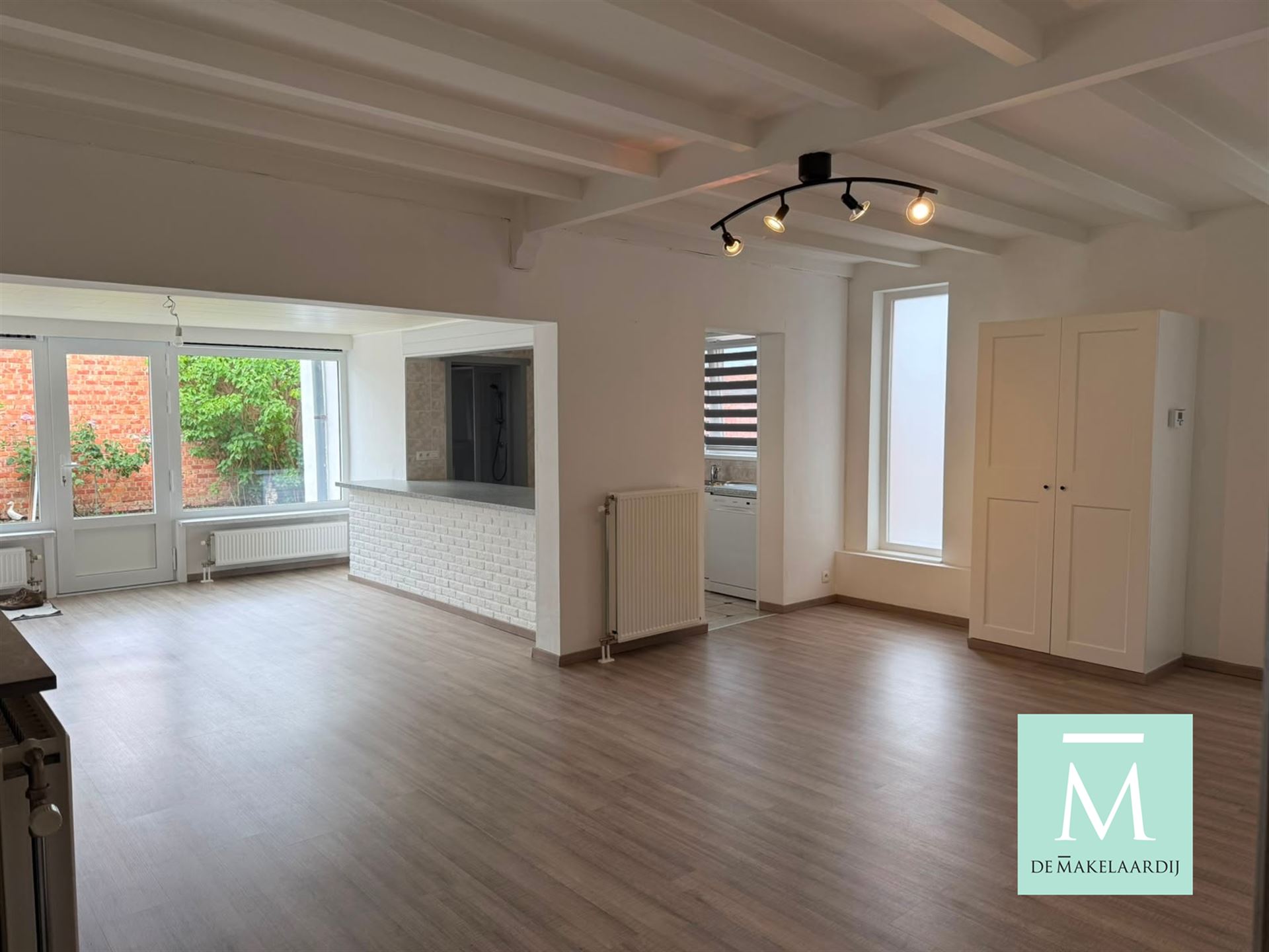 Instapklaar gelijkvloersappartement met 2 grote slaapkamers en tuin - foto 2