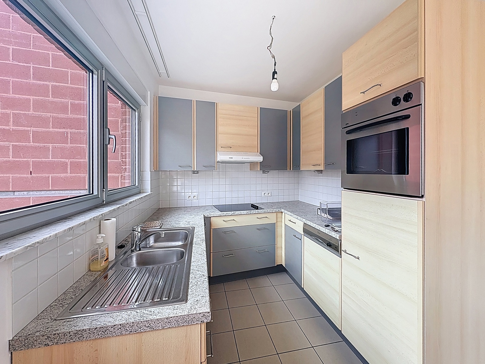 Appartement met 2 slaapkamers en tuin op 1e verdieping - foto 3