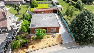 Looking for an accessible home with extra space and plenty of possibilities?<br />This detached home combines a practical, single-level layout with a spacious outbuilding and a sunny, enclosed garden.<br /><br />The home features a bright living area with a sitting and dining section, a kitchen, three bedrooms, two shower rooms, two toilets, and a laundry room. The wheelchair-accessible design offers added convenience.<br /><br />The separate outbuilding can be converted into a granny flat, a care home, a hobby room, a practice space, or a man cave. As a result, this property offers numerous possibilities for informal caregiving, working from home, or running a small business.<br /><br />The spacious garage accommodates two cars and features an electric sectional door. The long driveway provides additional parking on the property.<br /><br />Behind the house lies a sunny, fully enclosed garden where tranquility and privacy come together. It’s a lovely spot to start the day with a cup of coffee, do some gardening, or enjoy the company of family and friends on a summer evening.<br /><br /><br />Highlights:<br /><br />- Single-story home with 3 bedrooms<br />- Wheelchair-accessible living<br />- Separate, versatile outbuilding with various uses<br />- Potential for multigenerational living or as a care home<br />- Spacious garage for 2 cars<br />- Long driveway with additional parking<br />- Enclosed, sunny garden<br />- Spacious lot of 1,128 m²<br />- Quiet location in Ruddervoorde<br /><br /><br />Technical features:<br /><br />- Gas-fired central heating<br />- PVC windows with double glazing<br />- Electrical system certified as compliant<br />- Rainwater cistern available<br /><br /><br />Get a sneak peek at this home via a (drone) video; all documents are also available there: verkoopdossier.info/ruddervoorde59<br /><br /><br />Interested in making this home your own?<br /><br />Feel free to contact Tatjana at tatjana@albert.immo or by phone at 0496 51 31 75 for more information or to schedule an on-site visit.<br /><br /><br />At Albert, you’ll feel right at home!