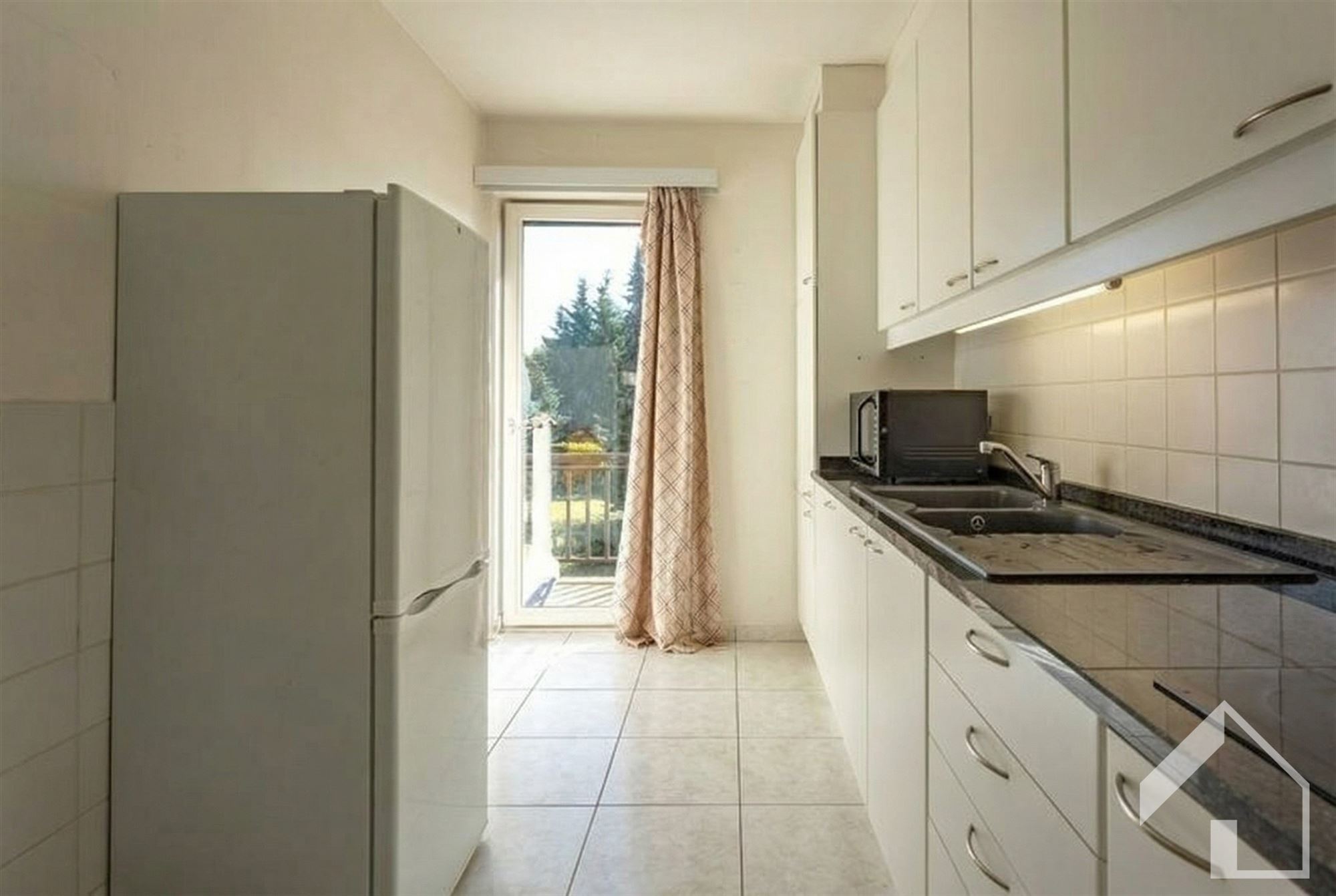 Appartement met 2 slaapkamers, terras, gemeenschappelijke tuin en lift. Optioneel Garagebox - foto 4