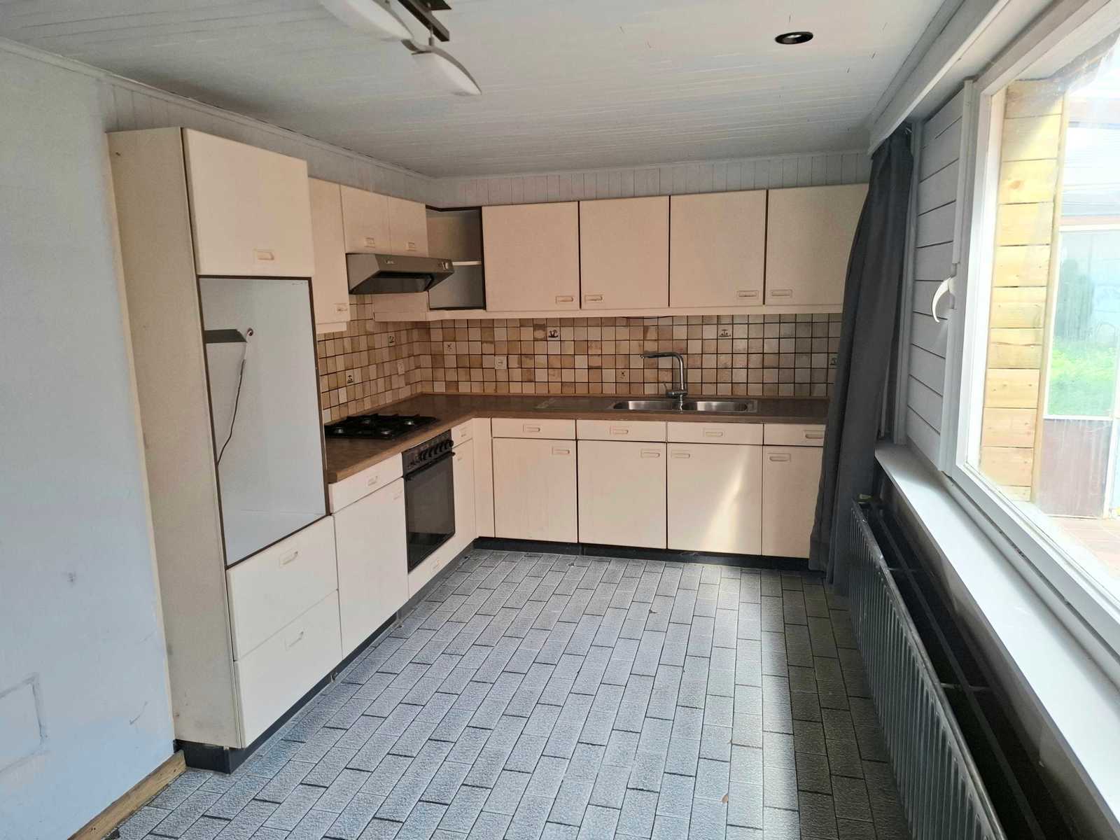 Te renoveren woning met 4 slaapkamers en garage in Geel-centrum - foto 4