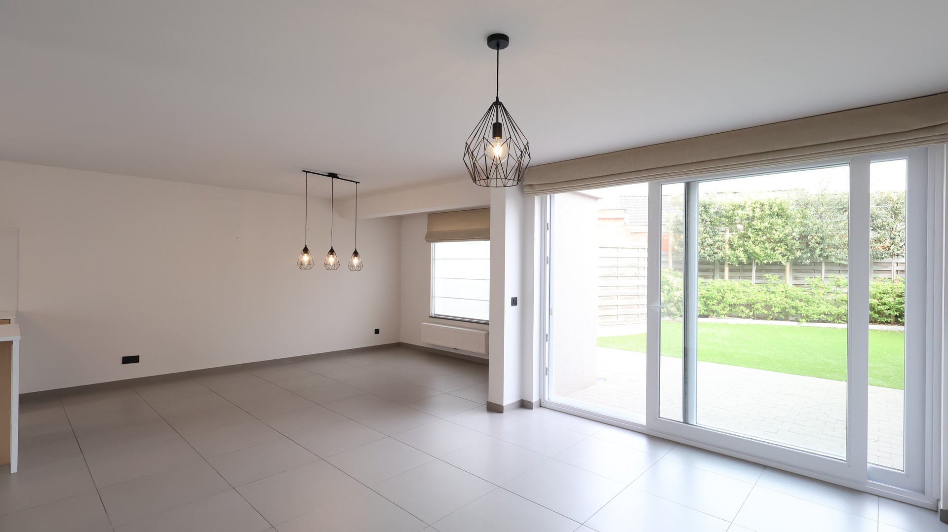 Verzorgde tussenwoning met drie slaapkamers en garage - foto 4