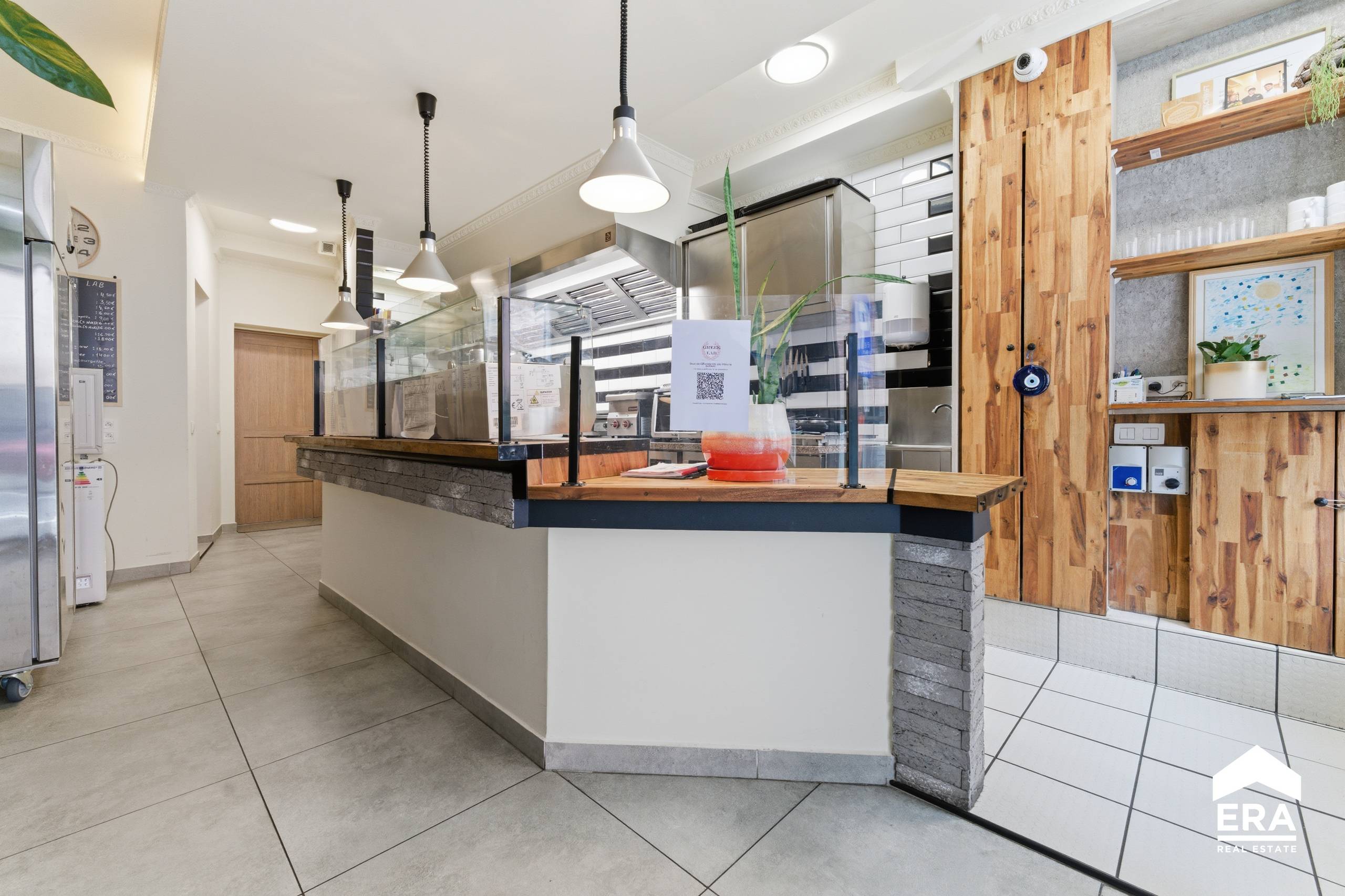 Ruime gerenoveerde woning met handelsruimte in Roeselare - foto 2