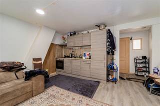 'Maison commerciale avec résidence - actuellement classée comme magasin + 2 studios loués à vendre à Anvers à Sint-Gummarusstraat 50 Situé dans un...