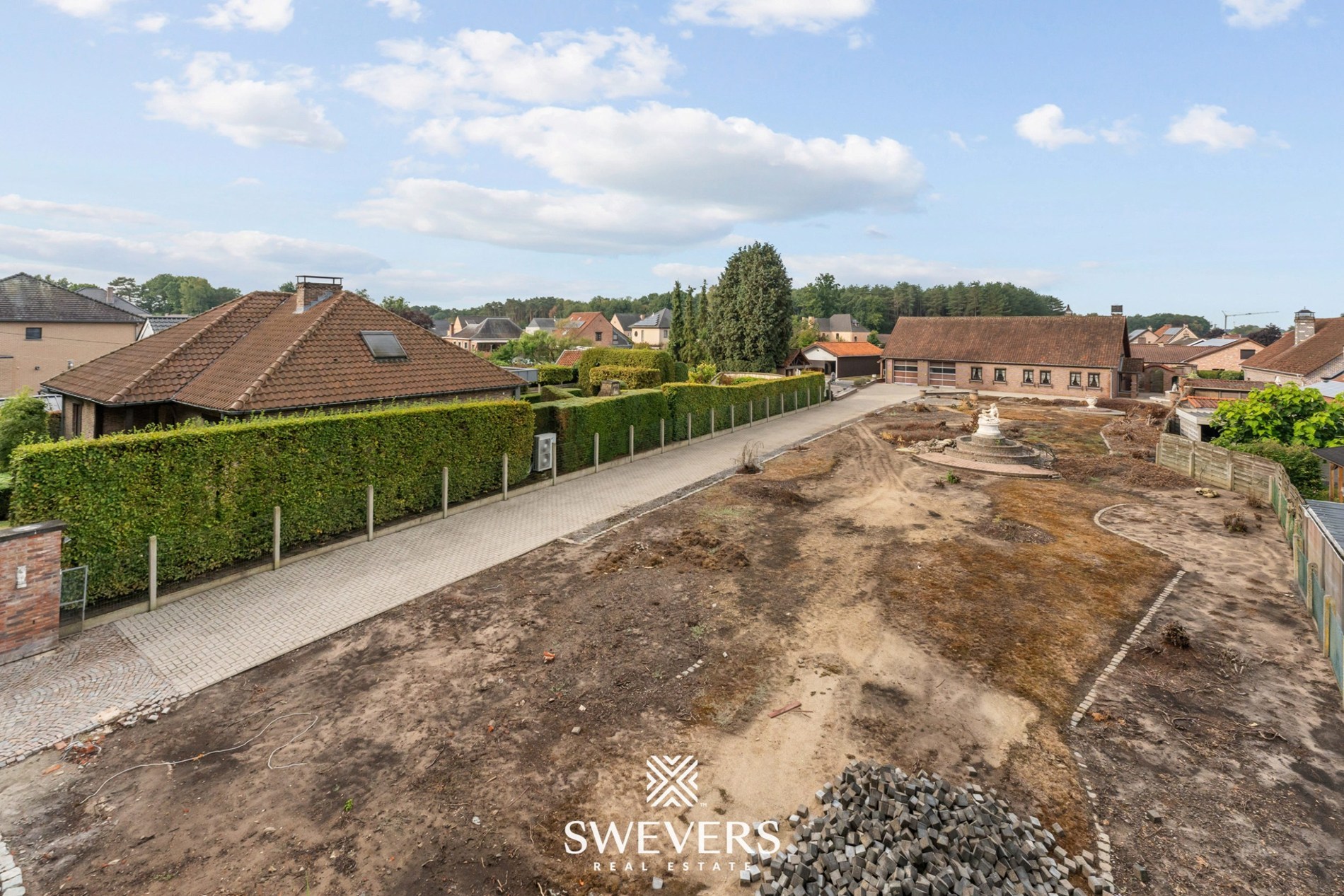 Ruime bouwgrond open-bebouwing met vrijstaande opslagruimte en garage - foto 4