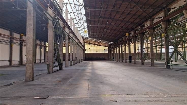 Bedrijfsgebouw van +/- 15.000 m² met VH: 9,5m in Deinze - foto 5