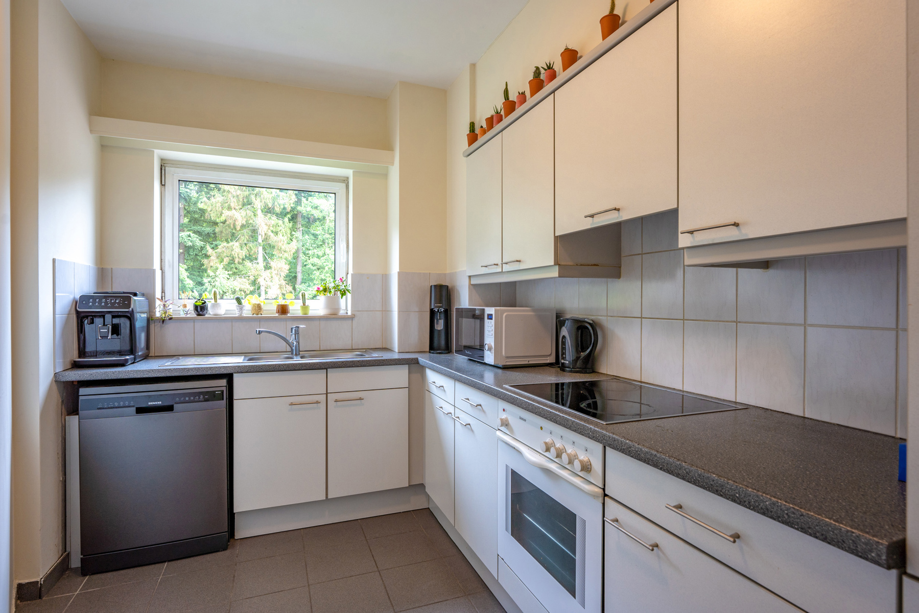 Een uitstekend gelegen, ruim appartement met terras en garage. - foto 5