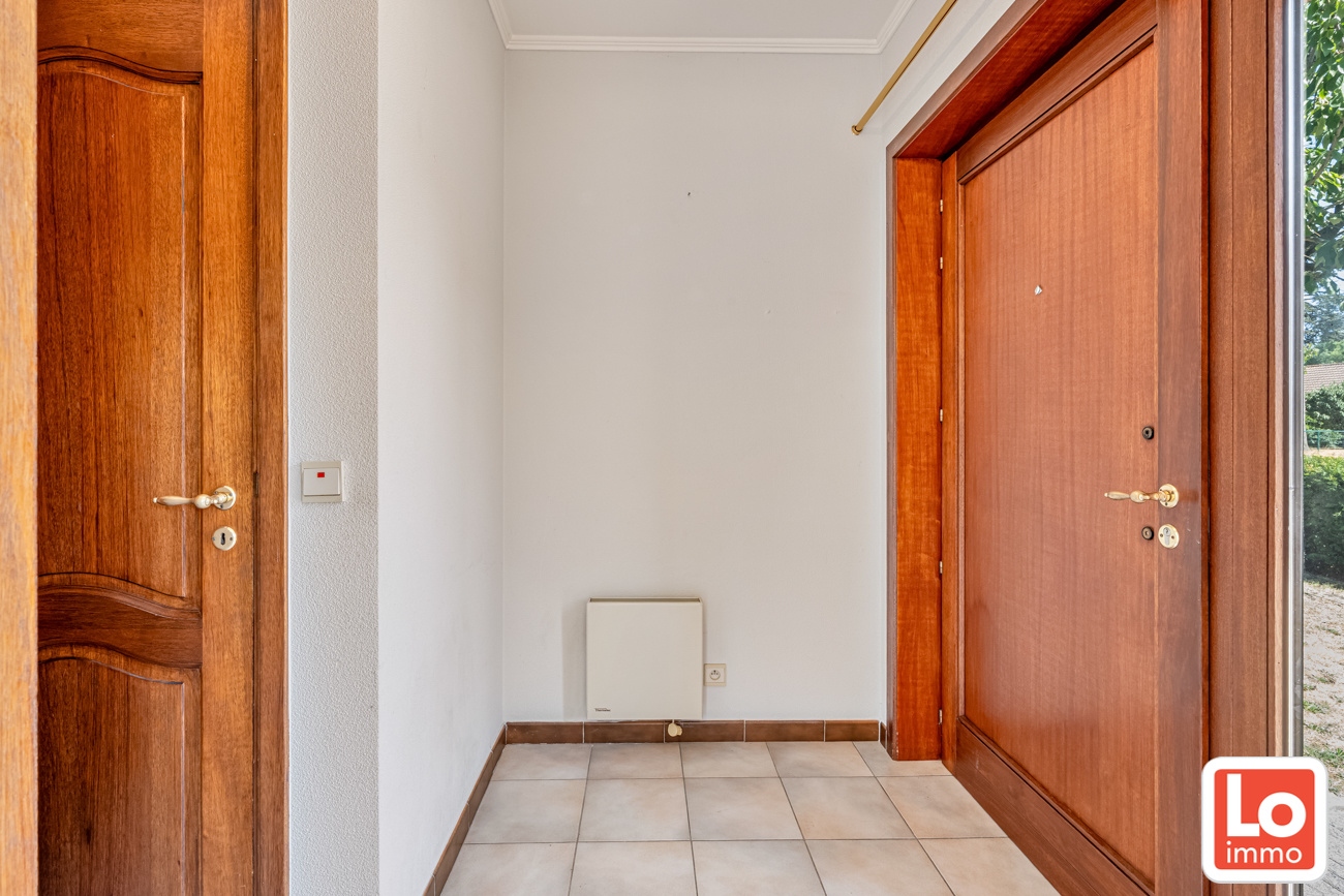 Gelijkvloerse open woning met dubbele inpandige garage en zonnige tuin op een toplocatie nabij het centrum van Lochristi! - foto 4
