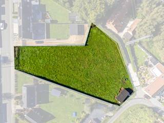 Découvrez cette opportunité unique de construire la maison de vos rêves sur un spacieux terrain à bâtir de pas moins de 2400 m², situé dans la...