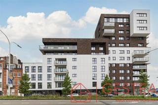 1140 EVERE (36 Jules Bordet Ave.) - Located just outside Brussels, in a new residential complex, this beautiful, warm, and bright apartment will...
