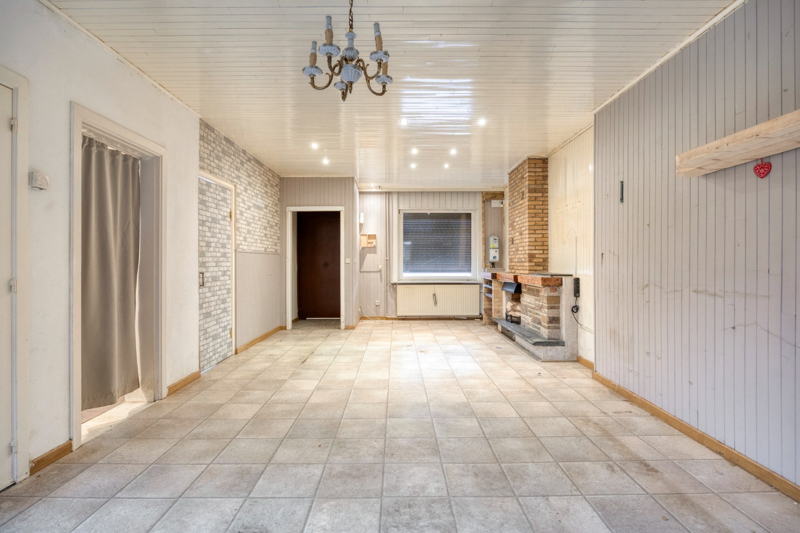 Te renoveren woning met 4 slpk. en gezellige stadstuin op een centrale ligging in Geel - foto 2