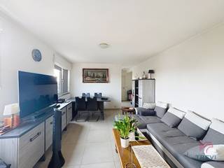 LAEKEN: Close to the Atomium and the Domain Royal as well as all amenities, 1-bedroom flat + parking +/-59m² on 5th floor with lift. It is composed...