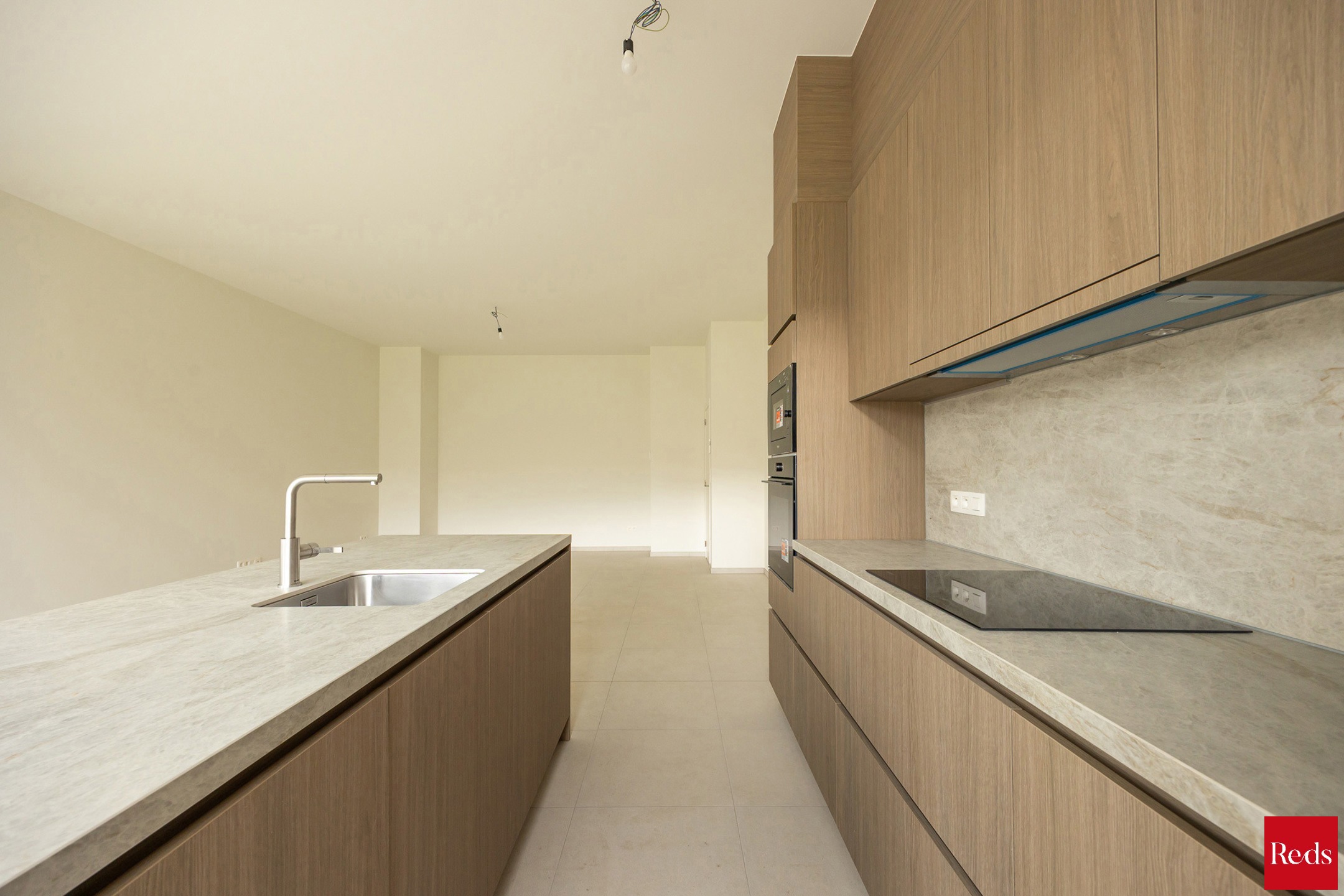 Ruim gelijkvloers nieuwbouwappartement met 3 slaapkamers - foto 5
