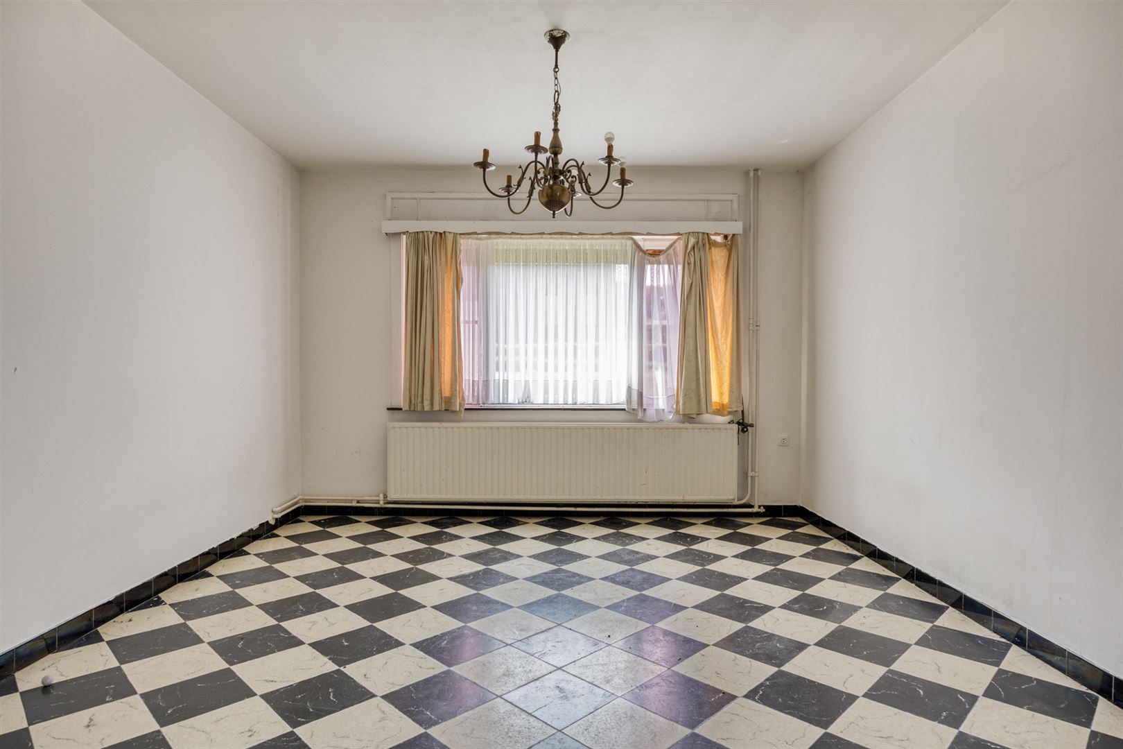 TE KOOP: Te renoveren woning met ruim perceel en projectmogelijkheden in Lummen! - foto 5