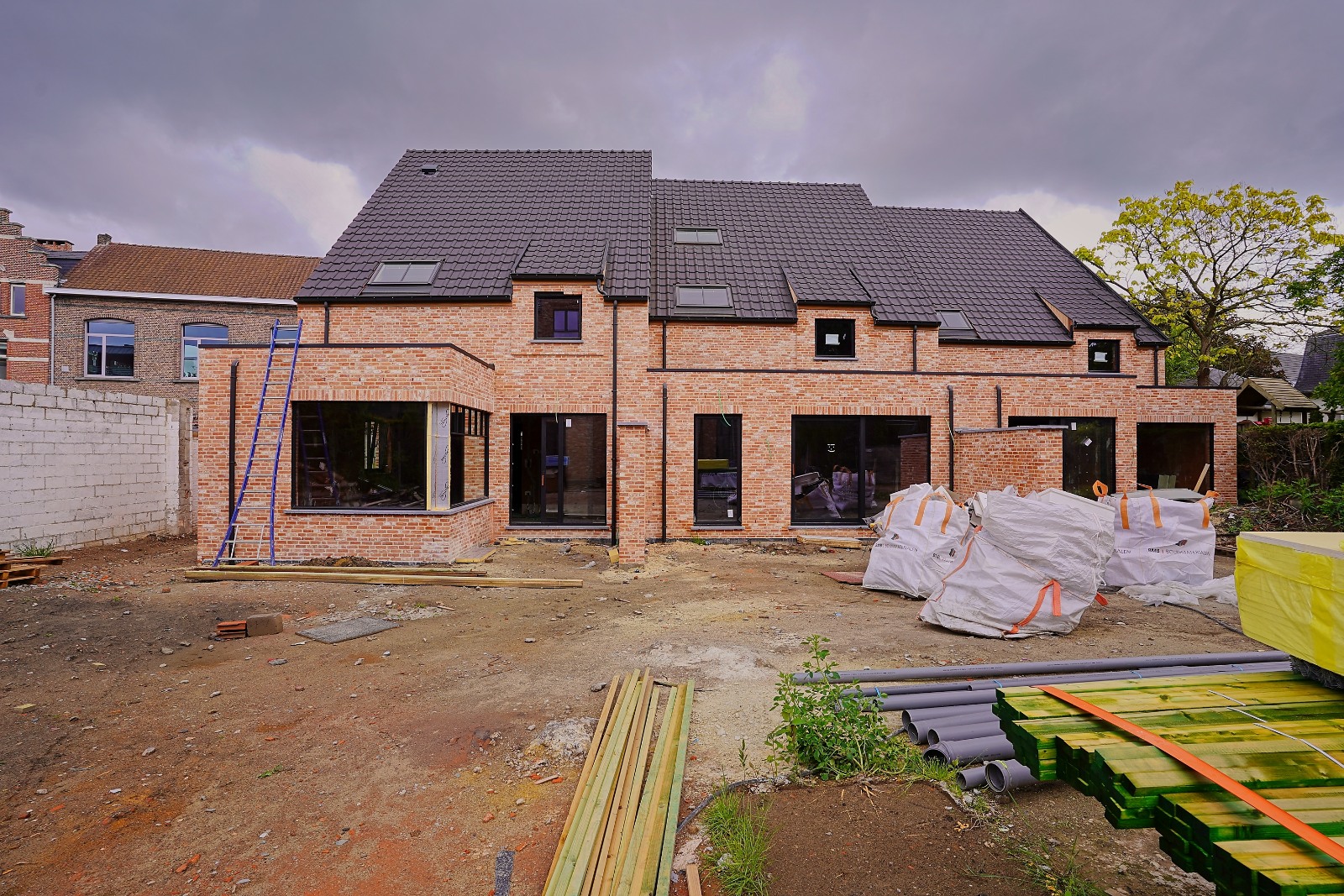 Nieuwbouwwoningen met zuidoriëntatie in het centrum van Bornem !!! - photo 3