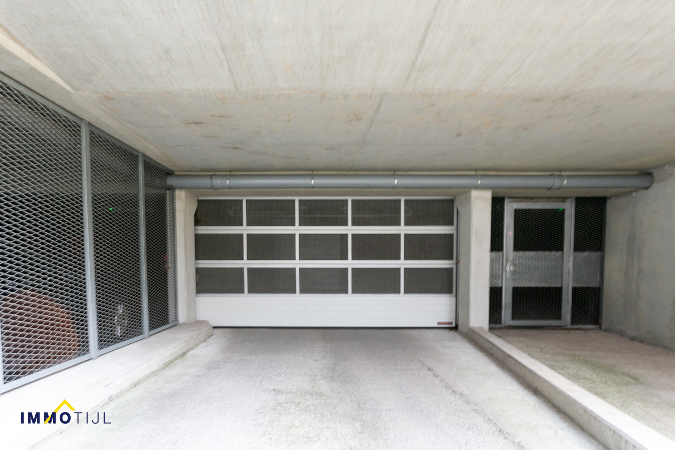 Ruime ondergrondse autostaanplaats centrum Opwijk! - foto 2