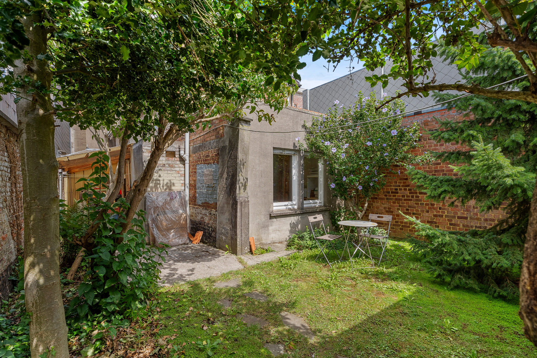 Ruime stadswoning met tuin-garage-commerciële mogelijkheden - foto 1