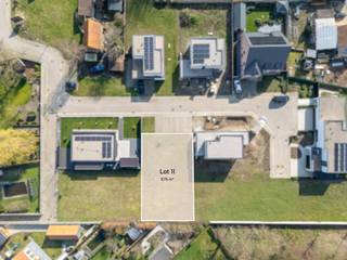 In een nieuwe woonbuurt 'Akkerrand', aan een invalsweg van de Oostmeetstraat ligt een mooi stuk bouwgrond (lot 11) met een oppervlakte van 575 m²,...