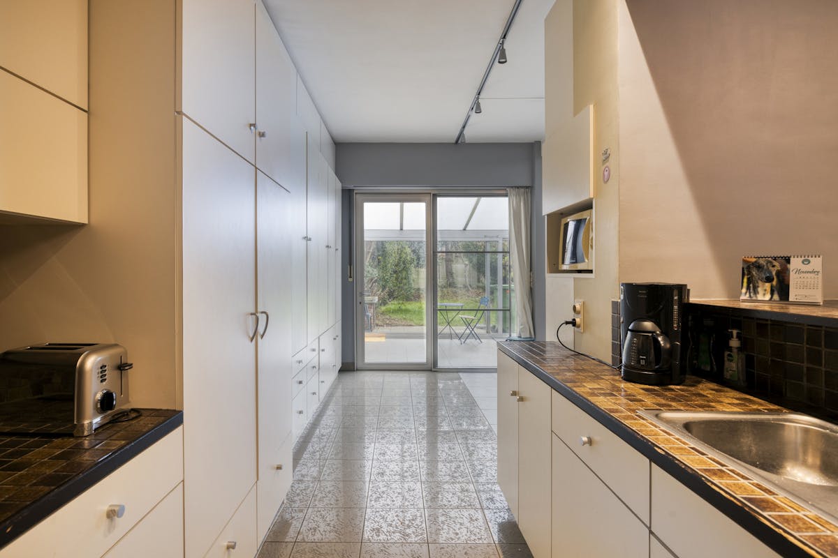 Ruim huis te koop Merksem met garage en zonnige tuin - foto 4