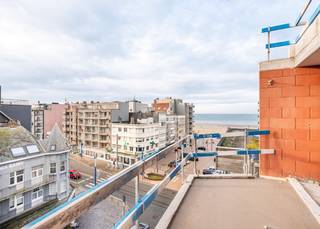 Residence ZonZicht: Your home base on the Coast<br /> <br />Discover residence ‘ZonZicht’, a stylish new development in the Zeelaan in Koksijde, just one minute's walk from the beach. The building, characterised by sleek lines and large windows, offers maximum natural light and timeless architecture. The high level of finishing and use of quality materials ensure long-lasting living comfort. <br /> <br />Residence ‘ZonZicht’ is ideal for those looking for a comfortable holiday base in Koksijde, with excellent accessibility and proximity to the town centre and town hall, where numerous activities take place. Moreover, this project is a strong investment, with possibilities for both holiday and year-round rentals.<br /><br />Layout: Entrance hall with wardrobe space | Open and fully equipped kitchen | Sunny living room opening onto a west-facing balcony (6,33 m²) with sea view to the side | Storage room with provision for washing machine | Bathroom with walk-in shower  and washbasin in furniture |Separate toilet with washbasin |2 bedrooms opening onto a rear balcony (1,66 m²) | Private cellar |Common bicycle shed |Common refuse area.<br /><br />Living in ‘ZonZicht’ means enjoying comfort, style, and an unrivalled coastal experience.