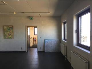Instapklaar en veelzijdig bedrijfsgebouw in industriepark Doornpark te Beveren-Waas, met 1.375 m² magazijn met 8m vrije hoogte en ca. 290...