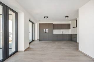Nieuwbouwappartement met frontaal Scheldezicht in een standingvol gebouw dat werd ontworpen door architect Max Dudler, gelegen op Nieuw Zuid;...