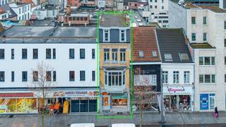 Prachtig eclectisch vooroorlogs winkelwoonhuis van ca 288 m² (cfr EPC) met originele winkelinrichting - met minimaal 6 slaapkamers + leuke...