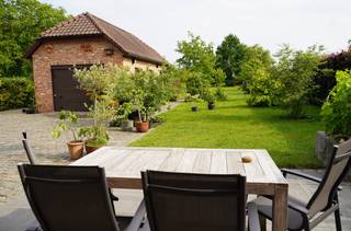 In Hortweidenweg 67, you will find this beautiful home on a 22-acre plot. This ready-to-move home with separate garage is ideal for large families or those looking for extra space for a (secondary) profession, studio or home practice. There are 4 bedrooms, with the possibility of a 5th room by installing a Velux.The house is quietly located a stone's throw from the bustling center of Zonhoven, close to nature reserves such as De Teut and De Platwijers, and with good accessibility. An energy renovation has recently been carried out: new windows and doors with triple glazing, wall insulation, ventilation and an 11 kWh home battery for optimal use of solar energy. The house also has a wired alarm system.Through the entrance hall with guest toilet, you reach a storage room, technical room and a multipurpose room with shower and sink facilities. The kitchen and living room face south and offer a beautiful view of the maintenance-friendly, pesticide-free garden. The kitchen is equipped with all modern comforts such as a steam oven, breakfast cabinet, dishwasher and induction cooker.Upstairs, you will find a spacious night hall, 3 large bedrooms, a modern bathroom and a large storage room with the potential for an extra room or dressing.