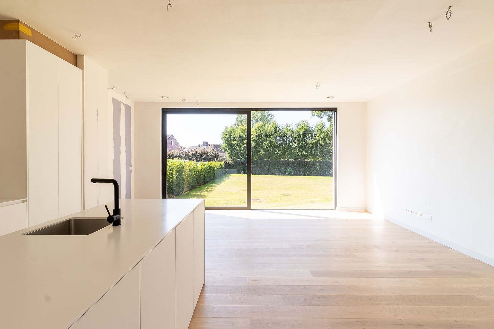 Hoogwaardig afgewerkt gelijkvloersappartement met tuin - foto 5