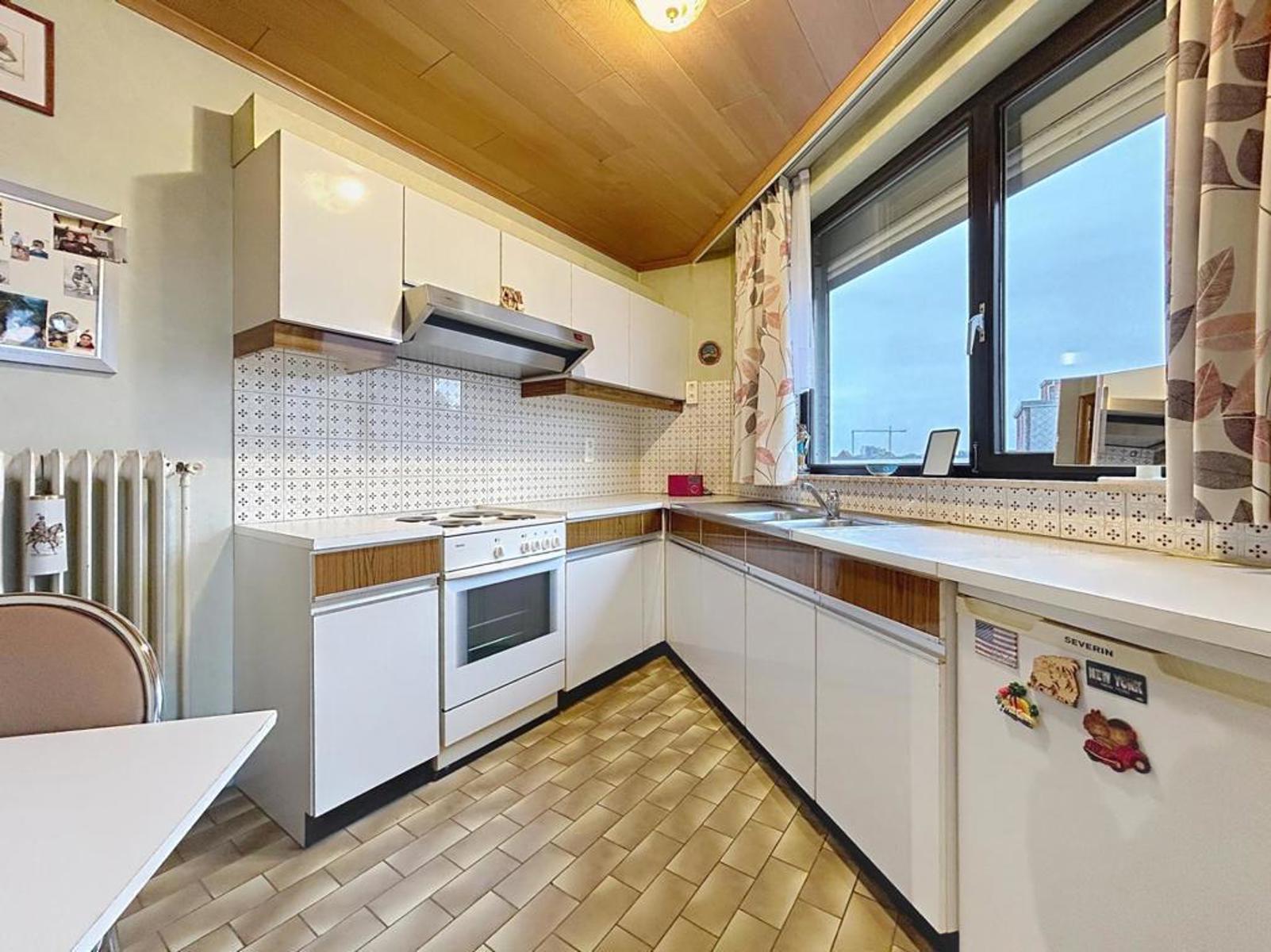 Centraal gelegen appartement met 2 slpks en garage - foto 5