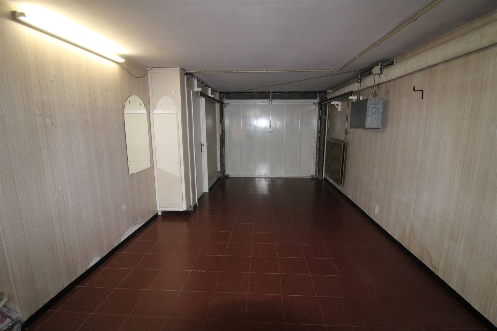Te moderniseren étagewoning met grote garage, centraal gel - foto 5
