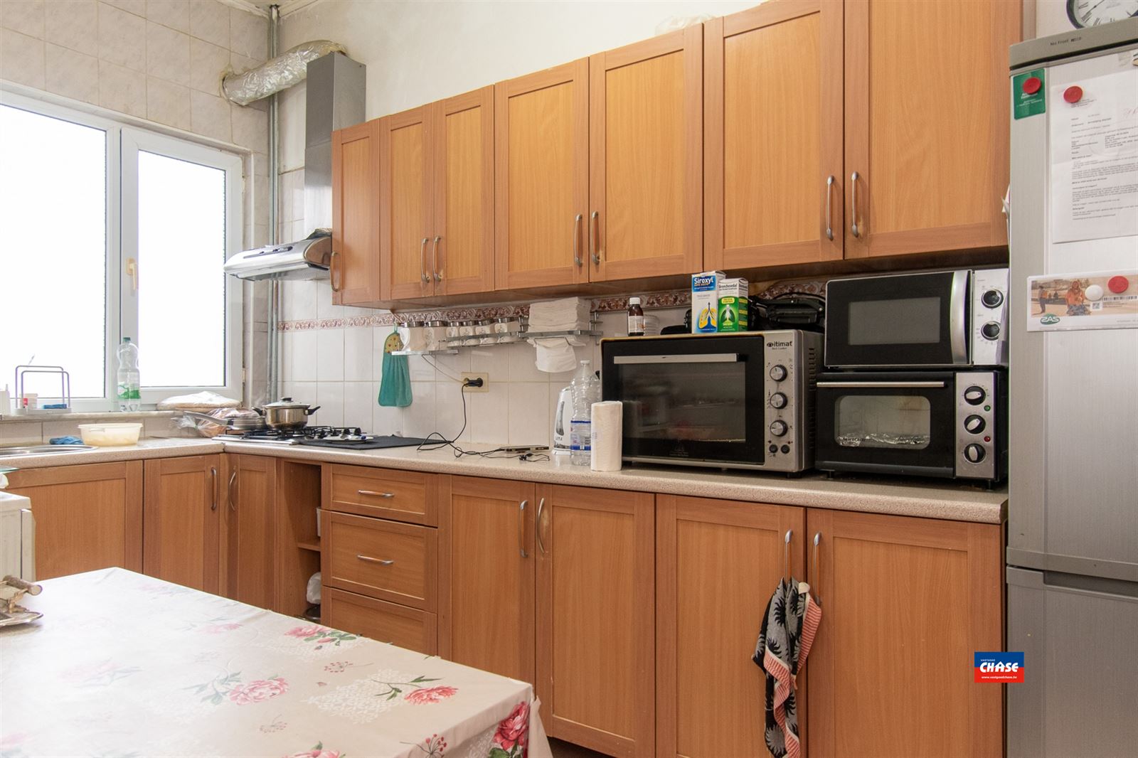 Ruime woning met 6 slaapkamers en handelsgelijkvloers - foto 5